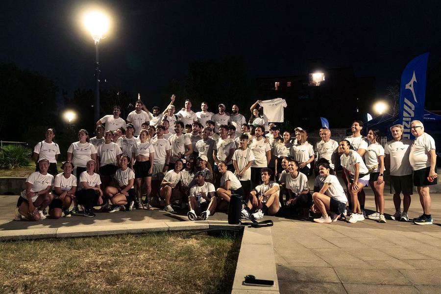 The whole group in white tees after a night run in Caserta